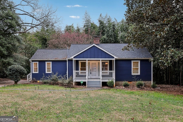 ranch-style house with a porch, crawl space, a front yard, and a shingled roof