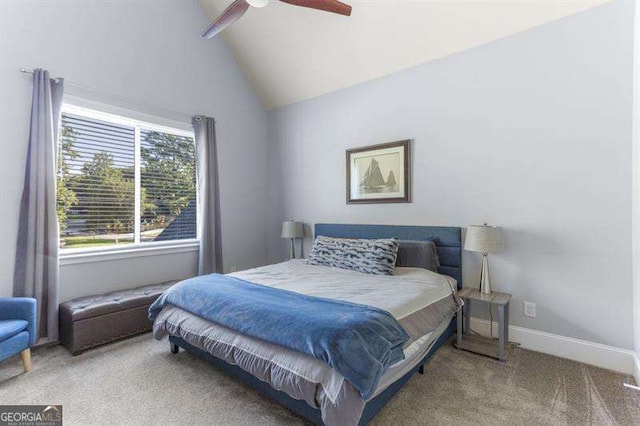 carpeted bedroom with high vaulted ceiling and ceiling fan