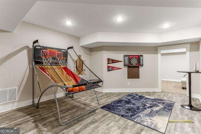 interior space with hardwood / wood-style flooring