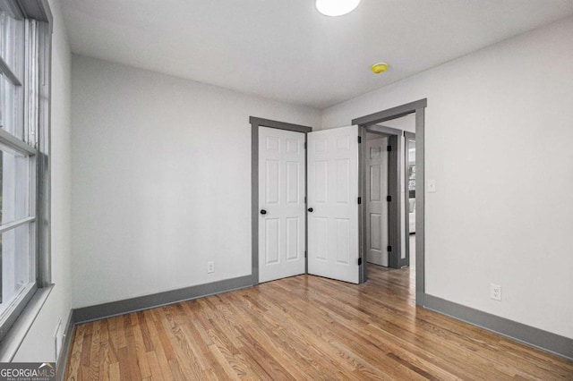 unfurnished bedroom featuring light hardwood / wood-style flooring