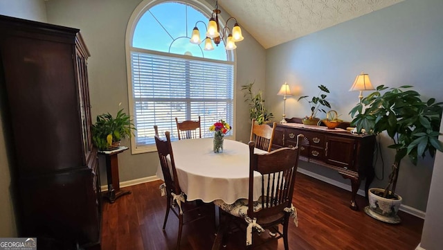 dining room with dark hardwood / wood-style flooring, vaulted ceiling, a chandelier, and a textured ceiling