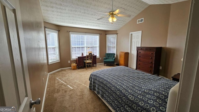 carpeted bedroom with lofted ceiling and ceiling fan