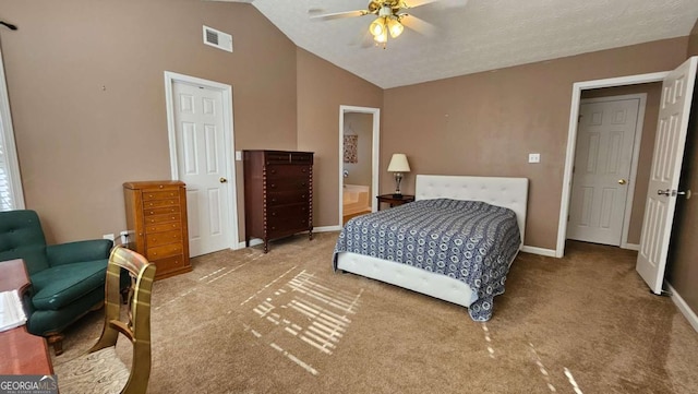 bedroom featuring vaulted ceiling, carpet, and ceiling fan