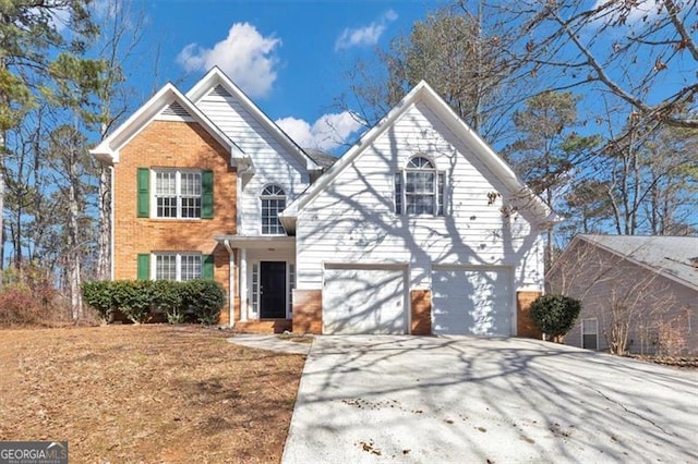 front of property with a garage