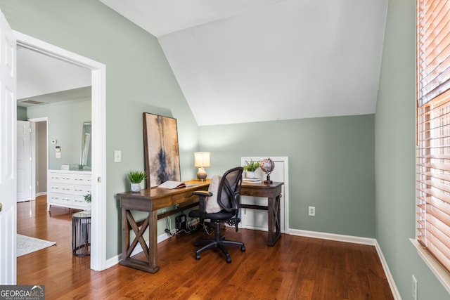 office featuring vaulted ceiling and hardwood / wood-style floors