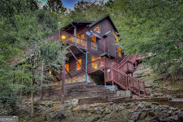 exterior space featuring a wooden deck