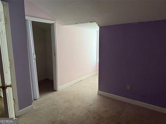 spare room with carpet