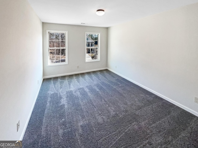 view of carpeted spare room