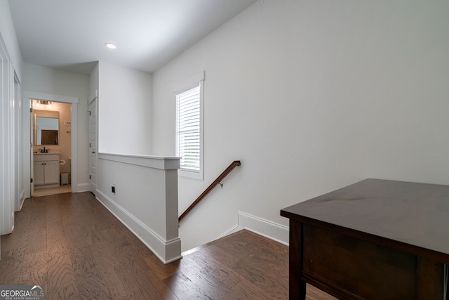 hall featuring dark wood-type flooring