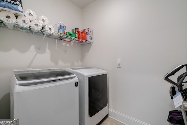 laundry area with washer and dryer