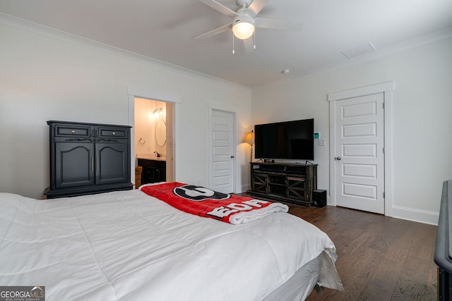 bedroom with ornamental molding, dark hardwood / wood-style floors, connected bathroom, and ceiling fan