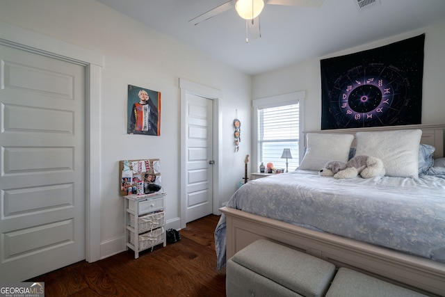 bedroom featuring ceiling fan and dark hardwood / wood-style flooring