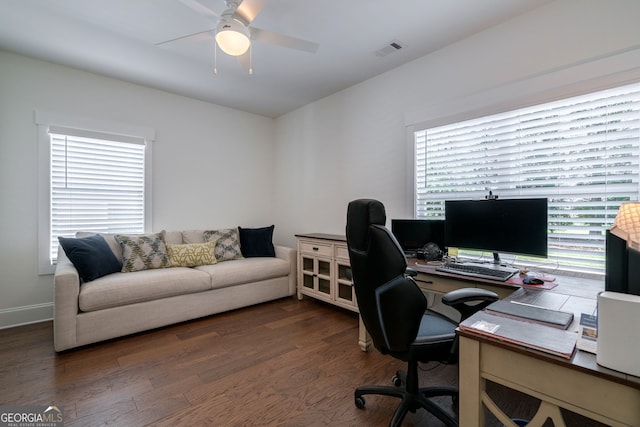 office with dark wood-type flooring and ceiling fan