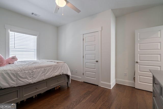 bedroom featuring ceiling fan and dark hardwood / wood-style flooring