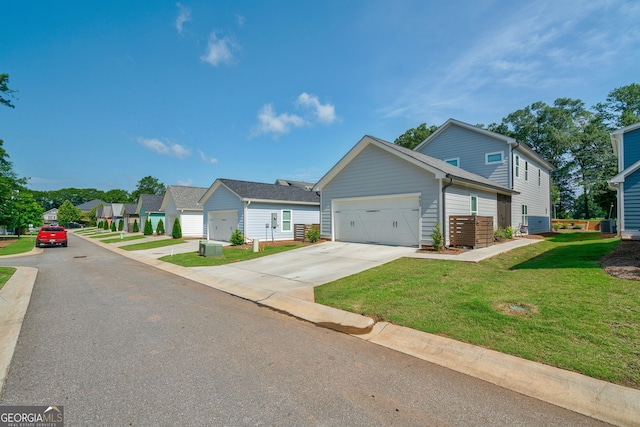 view of front facade featuring a garage and a front yard