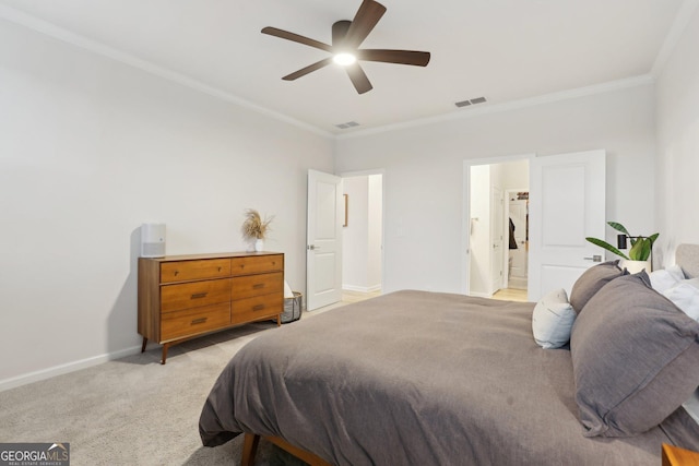 carpeted bedroom featuring crown molding and ceiling fan