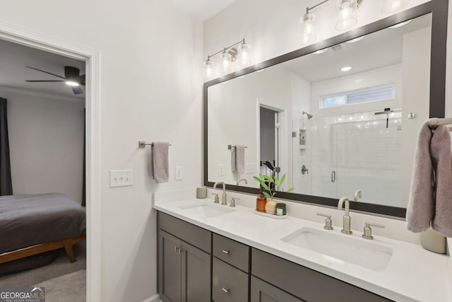 bathroom with vanity and an enclosed shower