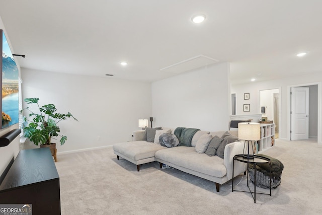 living room featuring light colored carpet