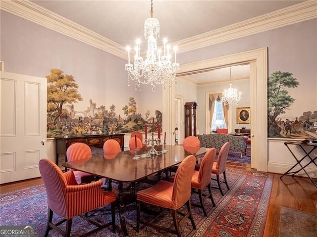 dining area featuring an inviting chandelier, ornamental molding, and dark wood-type flooring