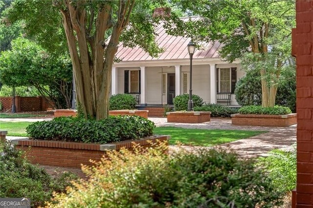 view of front of house with covered porch