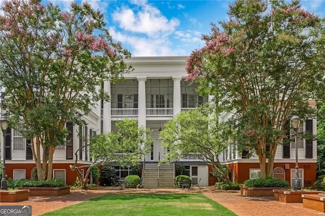 exterior space with a front lawn