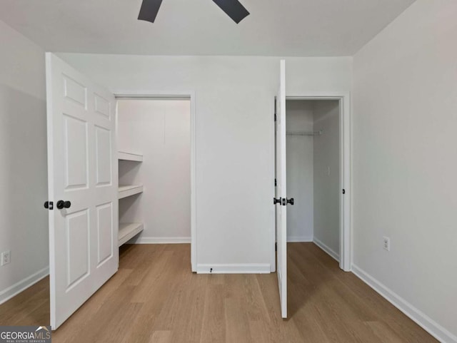 unfurnished bedroom featuring ceiling fan and light hardwood / wood-style floors