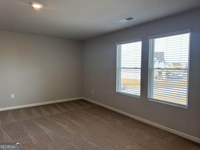 view of carpeted spare room