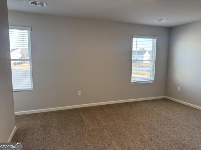 view of carpeted spare room