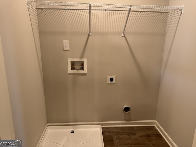 washroom with electric dryer hookup, washer hookup, and hardwood / wood-style flooring