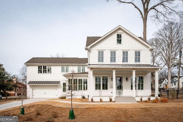 modern farmhouse style home with a porch and a garage