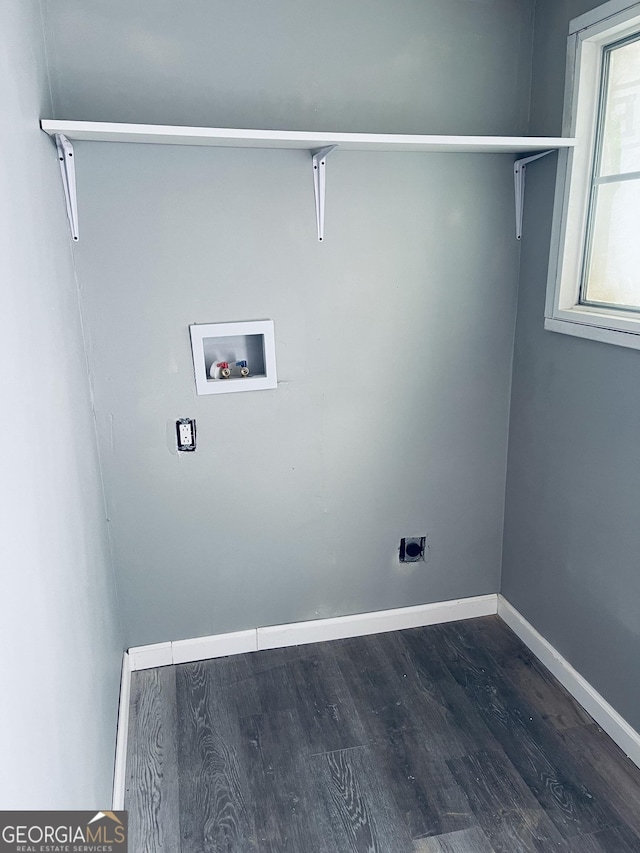 clothes washing area featuring washer hookup, dark hardwood / wood-style floors, and electric dryer hookup