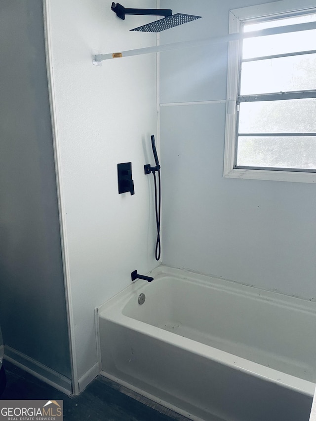 bathroom featuring tub / shower combination