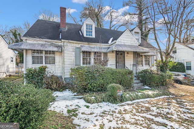 view of new england style home