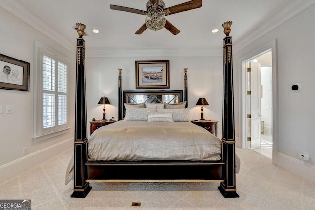 carpeted bedroom with connected bathroom, crown molding, and ceiling fan