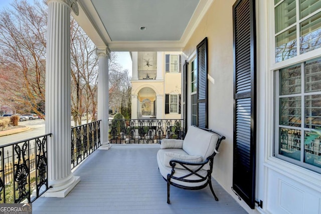 balcony featuring covered porch