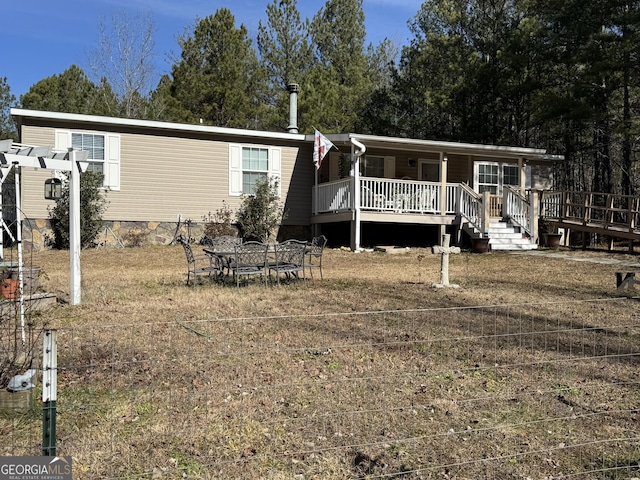 view of front facade featuring a deck