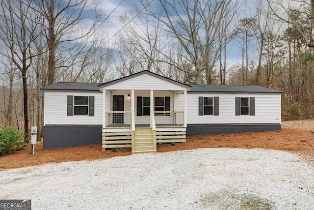 manufactured / mobile home featuring covered porch