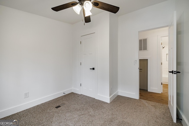 interior space featuring ceiling fan