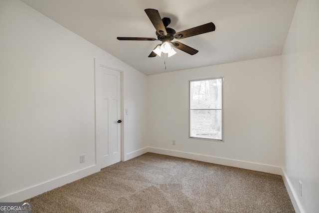 unfurnished room with carpet floors and ceiling fan