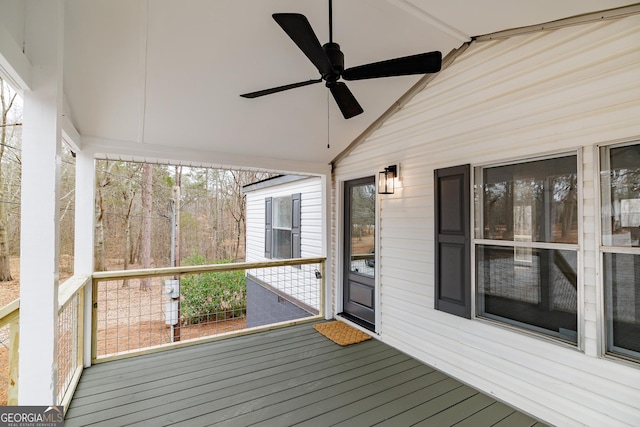 wooden deck with ceiling fan