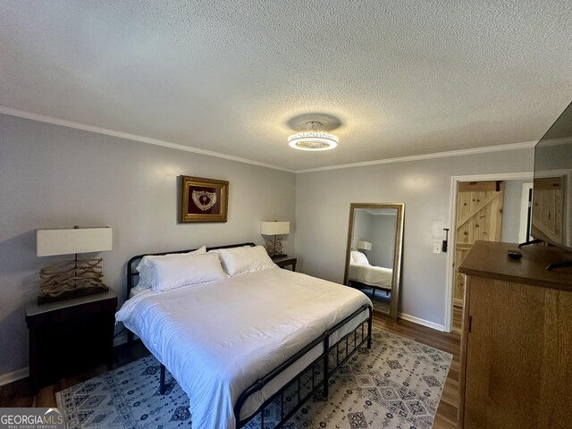 interior space featuring hardwood / wood-style flooring and crown molding