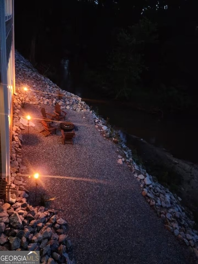 view of yard at night