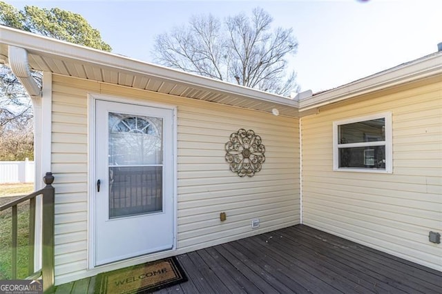 doorway to property with a wooden deck