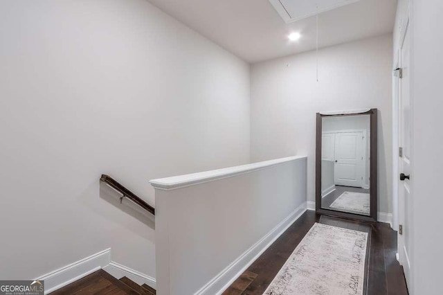 hallway featuring dark hardwood / wood-style floors