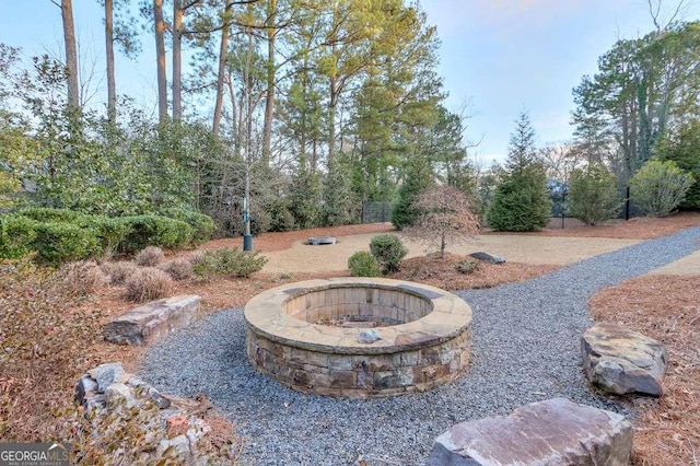 view of yard featuring a fire pit