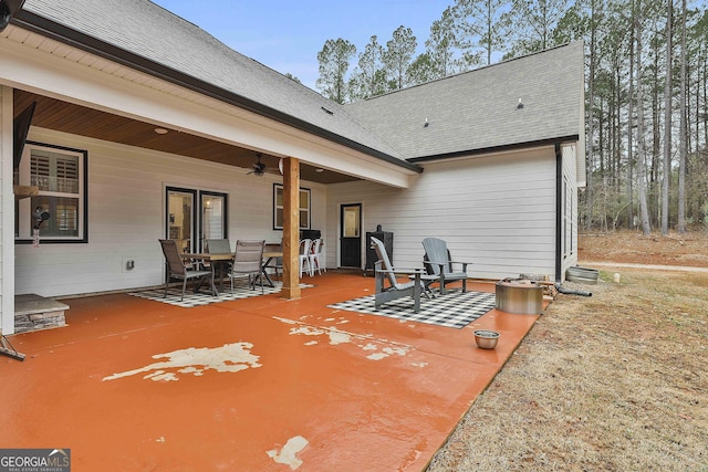 exterior space with ceiling fan