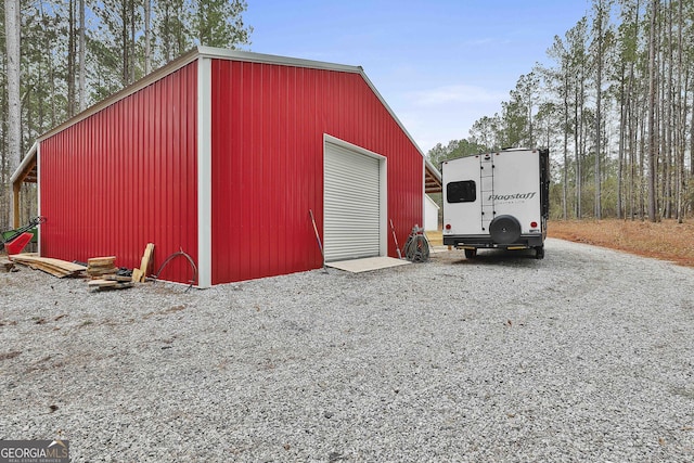 view of outdoor structure featuring a garage