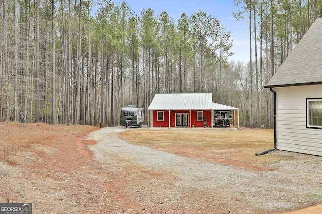 exterior space featuring a carport