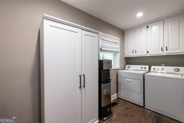 washroom with cabinets and independent washer and dryer