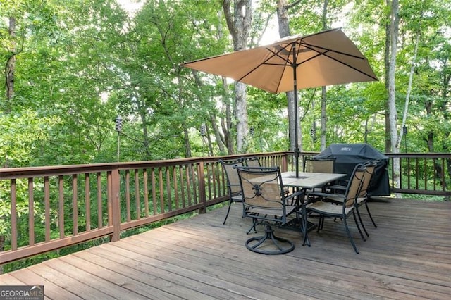 wooden terrace with grilling area